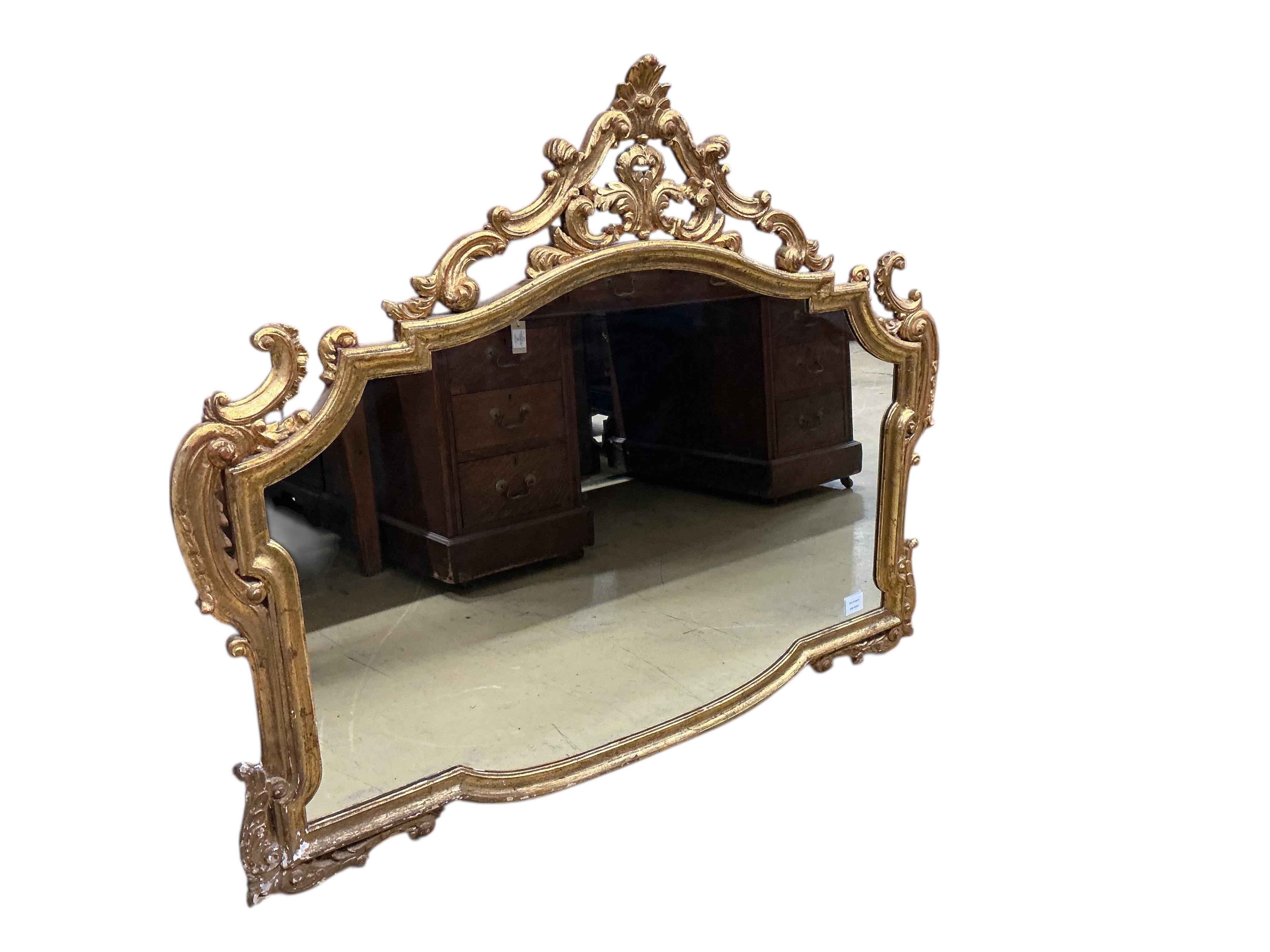 A Victorian style carved giltwood and composition wall mirror, width 120cm, height 95cm